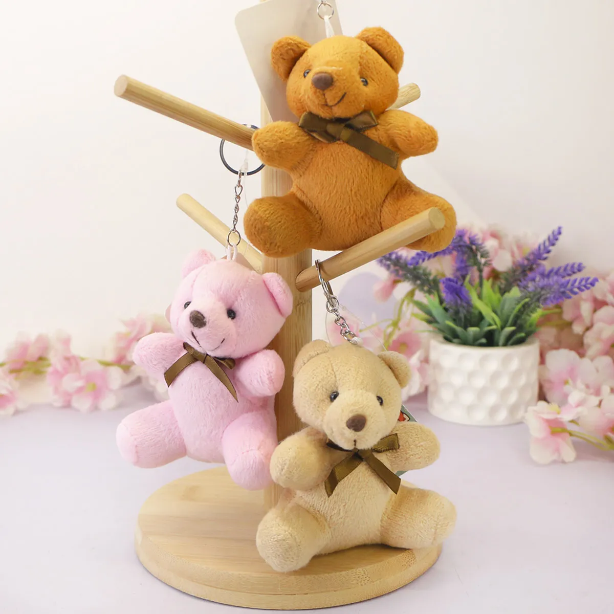 Мягкий брелок медведь сидячий с бантом, 10 см от plush.team
