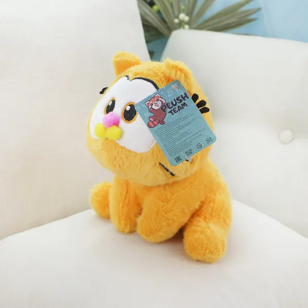 фото игрушки Желтый кот Гар сидячий, 22 см