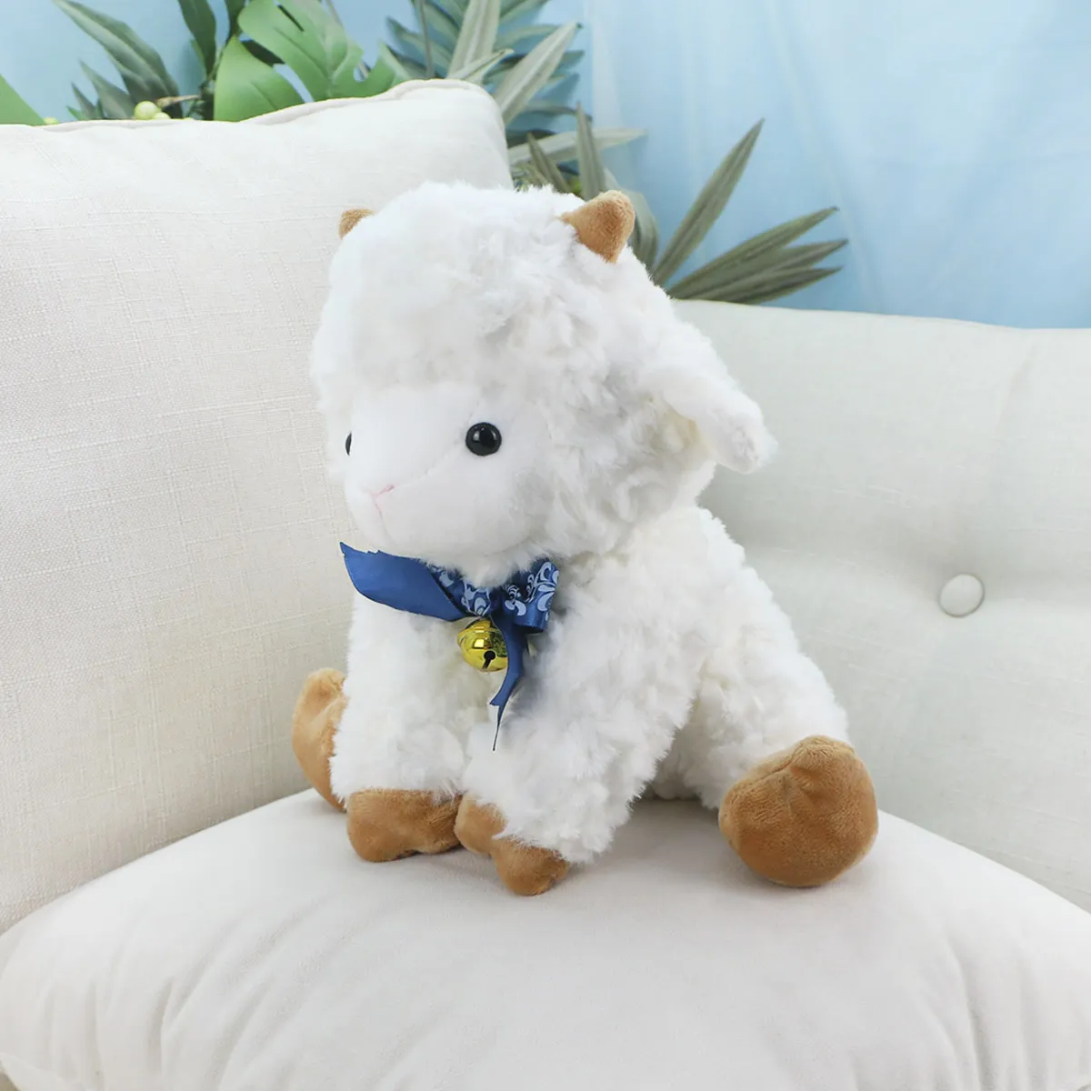 Овечка с синим бантом, 25 см от plush.team