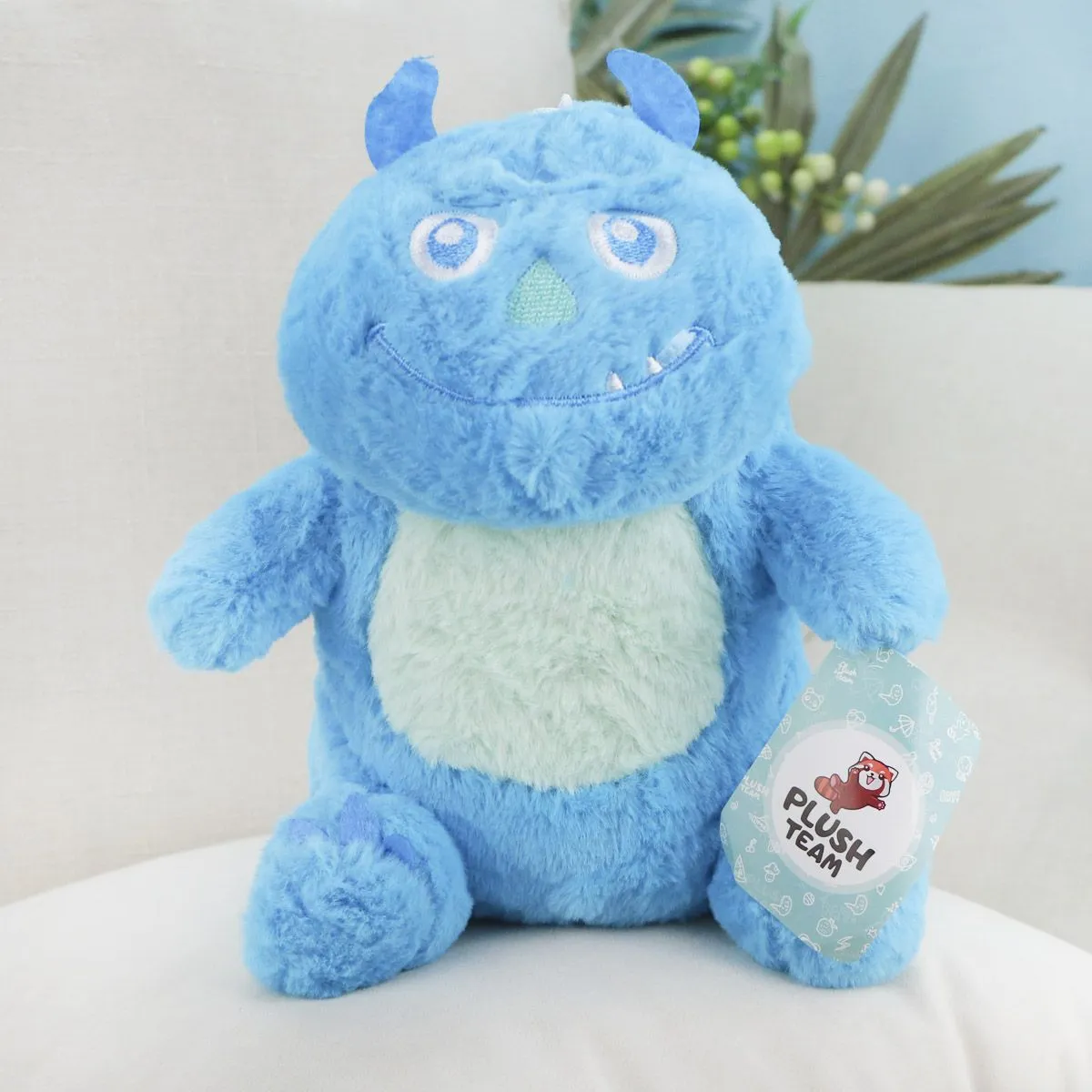 Монстрик синий пушистик сидячий, 20 см от plush.team