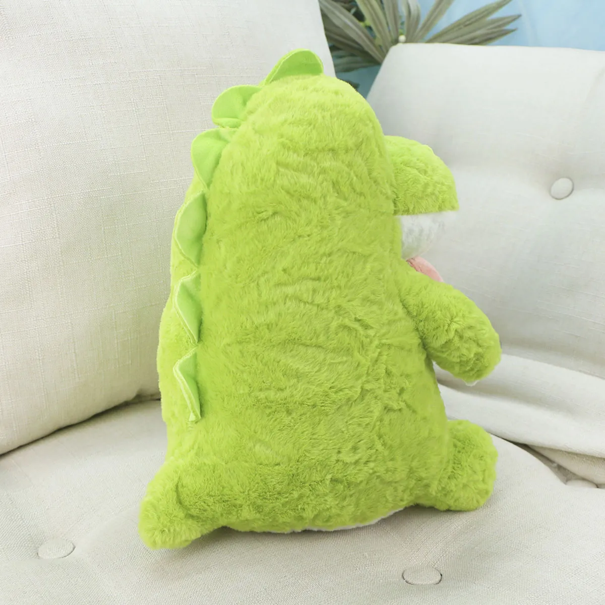 Динозавр пухлый с леденцом, 29 см от plush.team