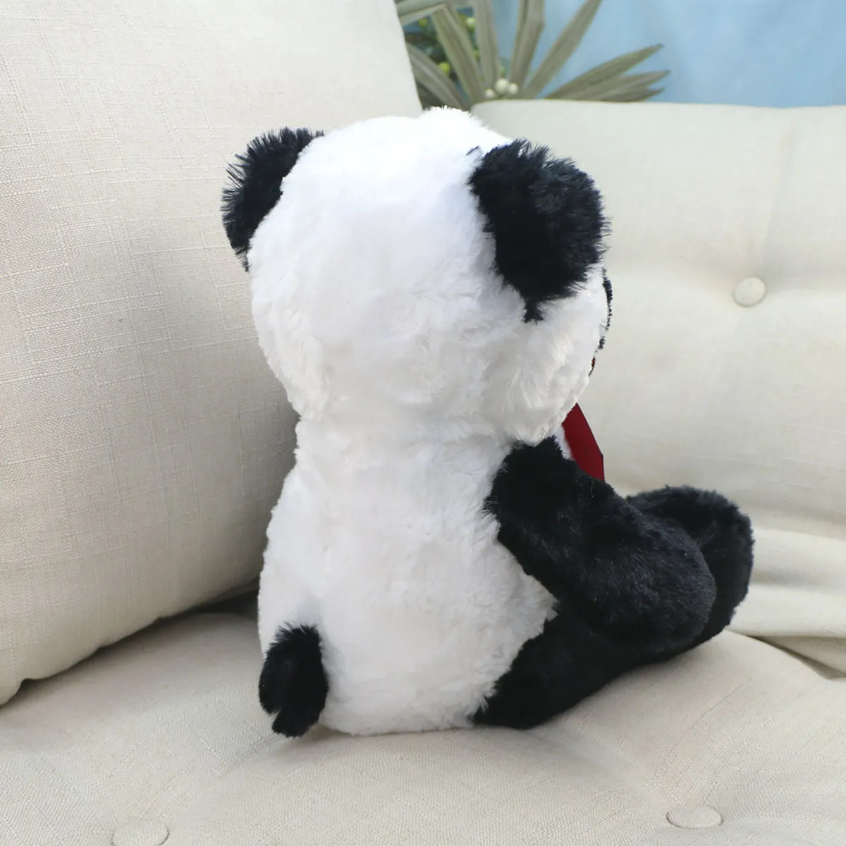 Панда Тофи с красным бантом, 35 см от plush.team