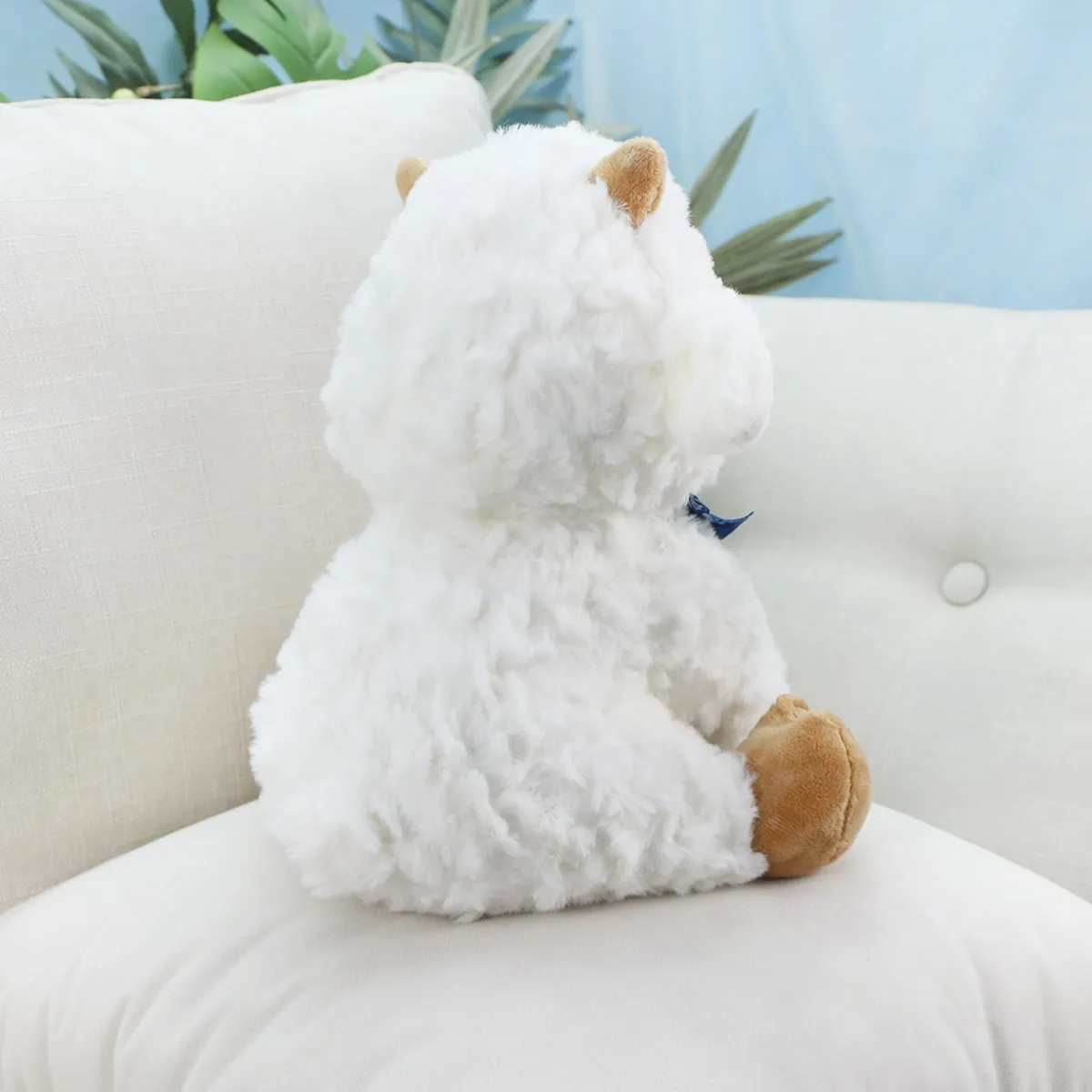 Овечка с синим бантом, 25 см от plush.team