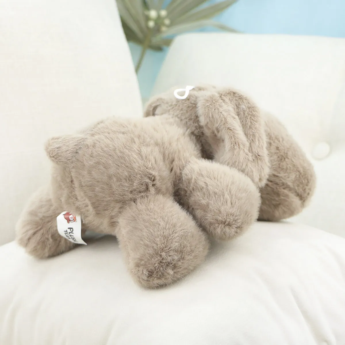 Собака Плюша лежачая, 25 см от plush.team