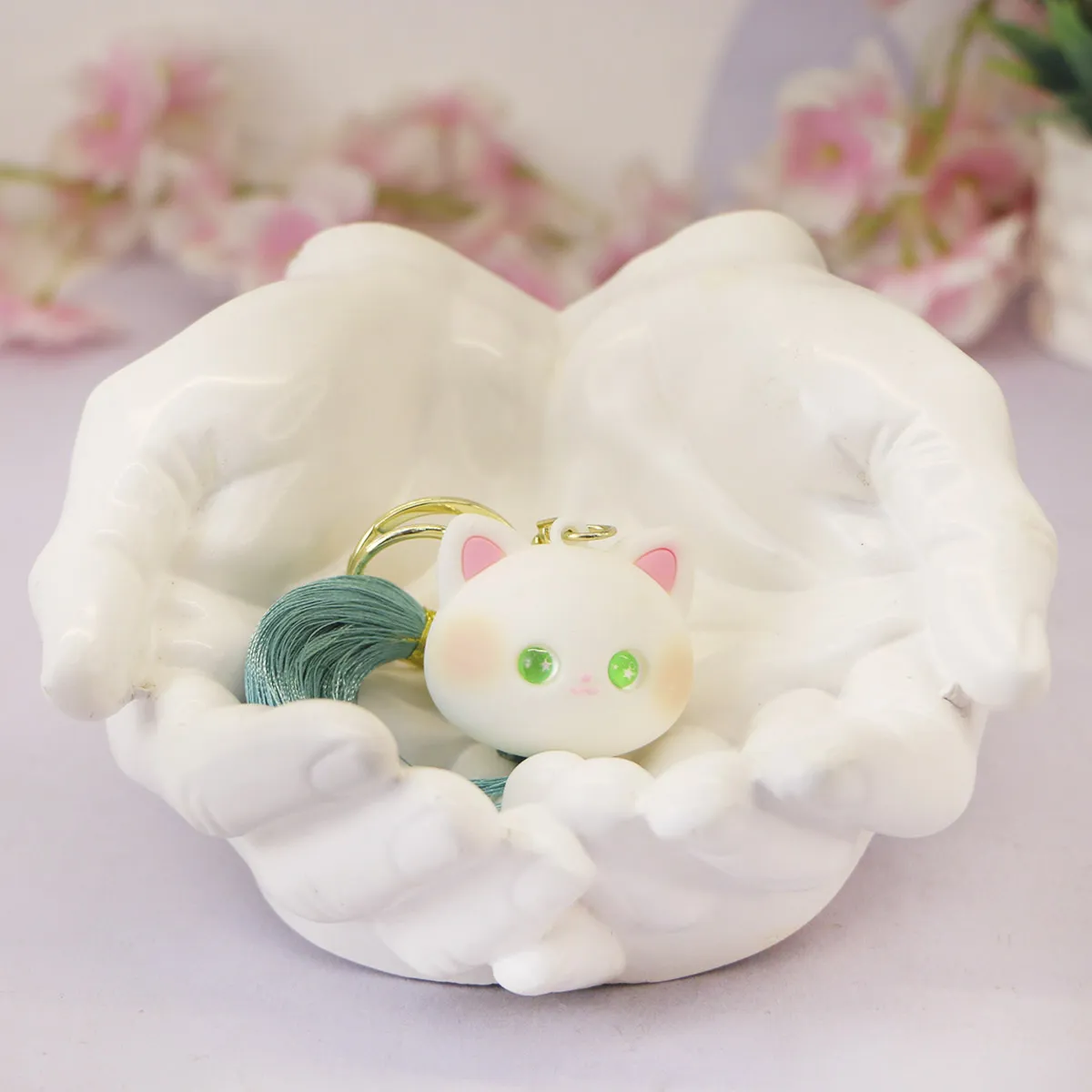 фото игрушки Брелок резиновый кот с подвеской, 4 см