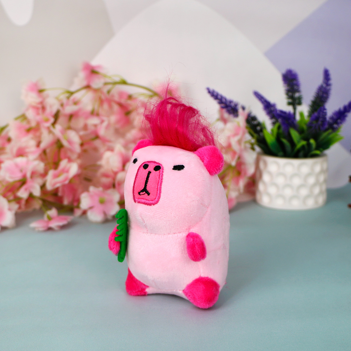фото игрушки Брелок мягкий капибара волосатая с расчёской, 11 см (Розовый)