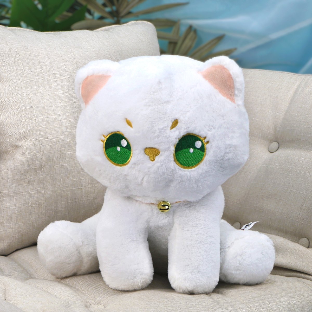фото игрушки Котик сидячий с зелеными глазами, 40 см